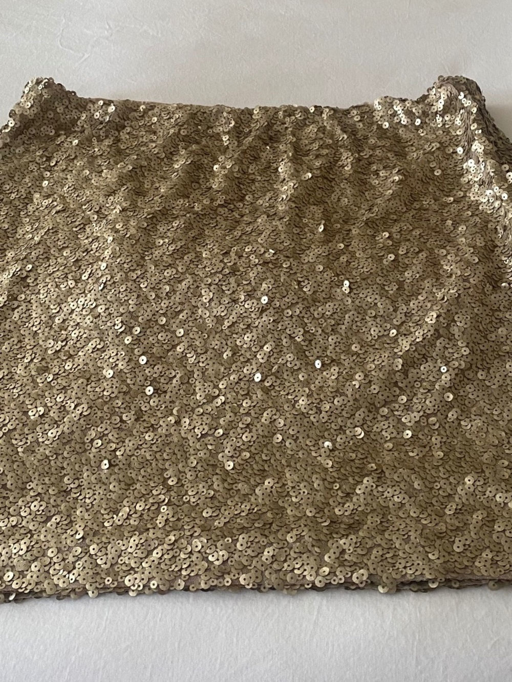 Women's sequined skirt in gold tone